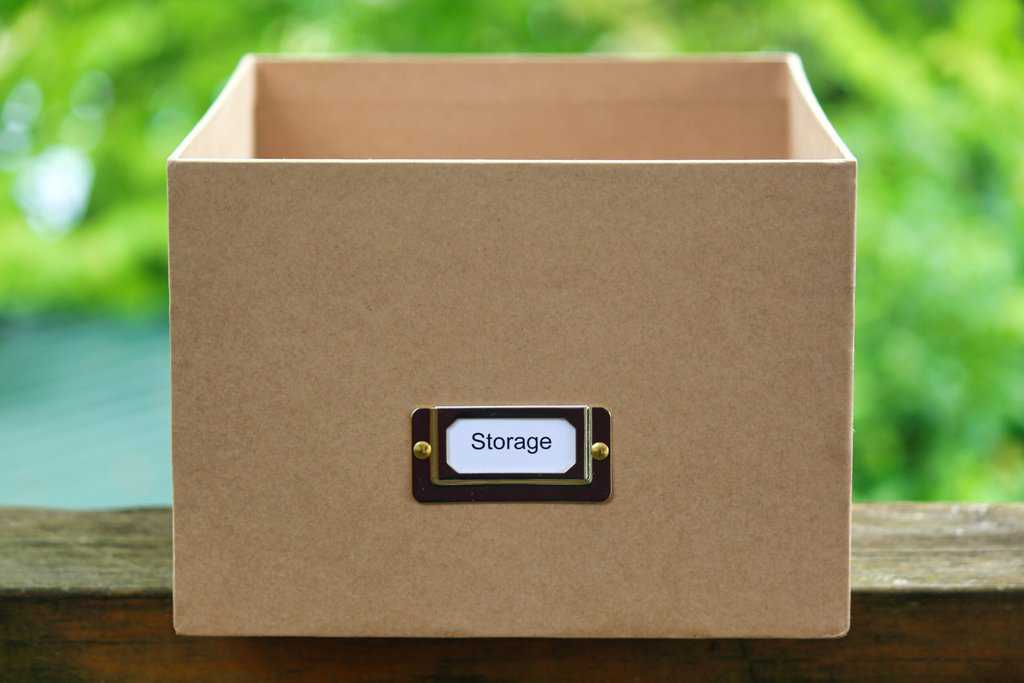 a brown storage box with a label on it.