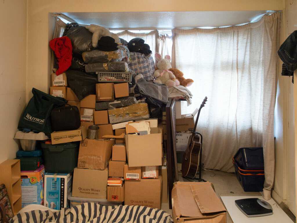 a pile of boxes in a room.