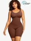 A woman is posing in a brown body shaper.